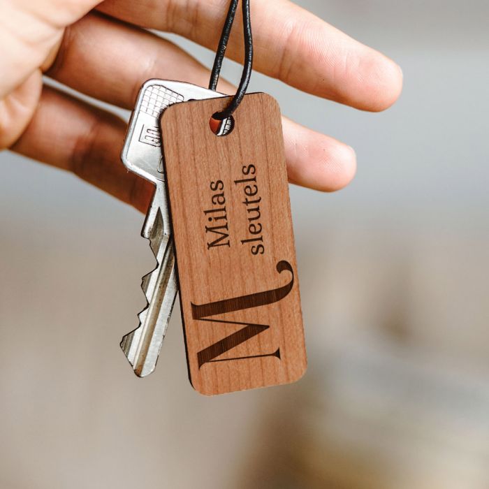 Kerstcadeaus shoppen Houten sleutelhanger met tekst gegraveerd