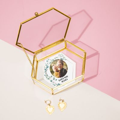 Glazen box met blaadjes, beeld en tekst Glazen box met blaadjes, beeld en tekst