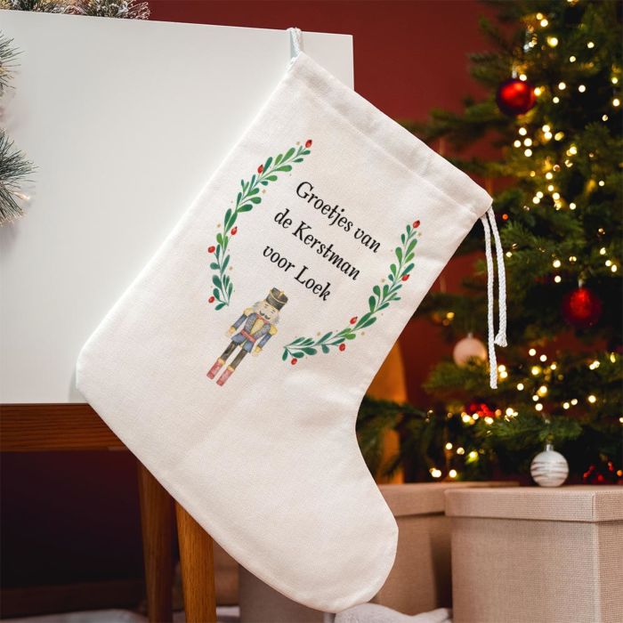 Gepersonaliseerde kerstsok met symbool en tekst