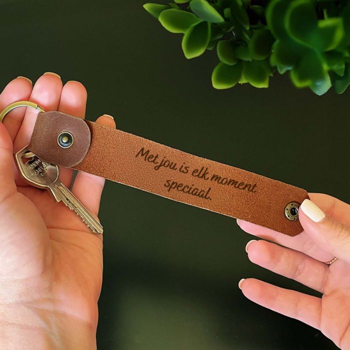 Gepersonaliseerde sleutelhanger met geheime boodschap