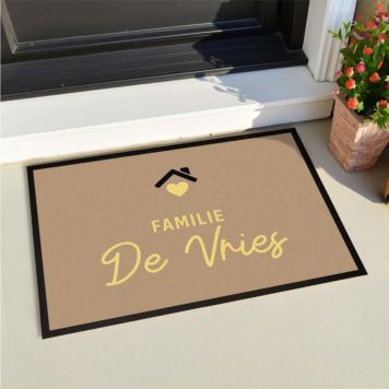 Gepersonaliseerde deurmat met tekst en symbool
